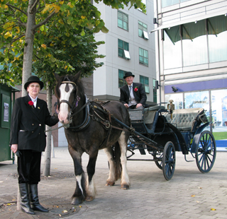 Séamus Nolan:  Dock tour , 2008, with drivers Michael and Mary McGrath, Cork Docklands; photo / courtesy Treasa O\